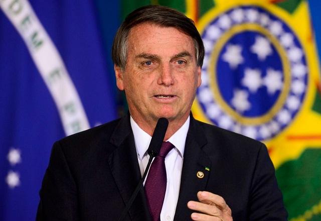 Jair Bolsonaro fala ao microfone (Marcelo Camargo/Agência Brasil)