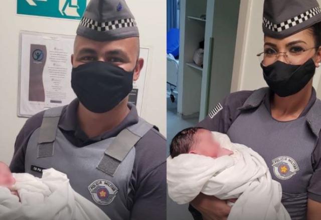 Policiais com bebê no colo