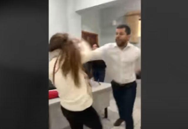 Imagem gravada mostra procurador desferindo soco contra mulher (Reprodução/SBT)