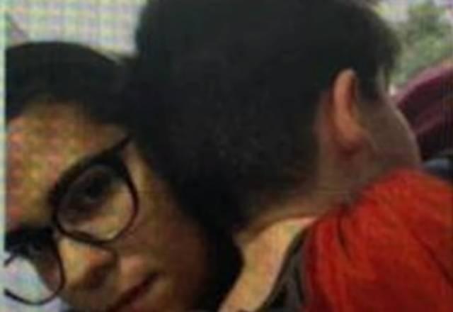 Thayná Ferreira com o menino Henry no colo | reprodução SBT