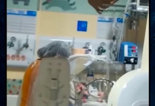 a imagem mostra uma uti neonatal e um bebê internado sob observação médica