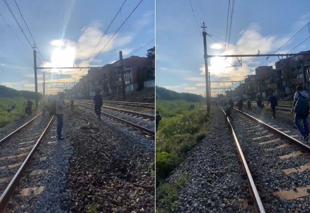 Passageiros caminharam sobre os trilhos na manhã desta segunda-feira (10) | Reprodução/Redes sociais