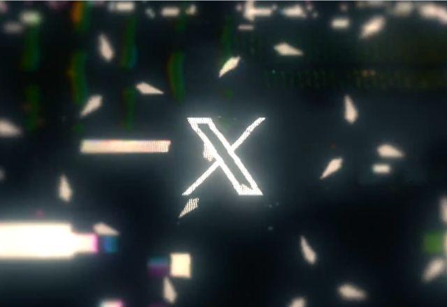 marca que vai substituir o twitter a rede social vai se chamar X. a imagem mostra um fundo escuro com luzes e no centro a letra X estilizada