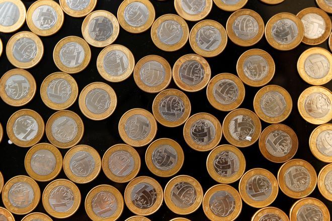 Moedas | REUTERS/Bruno Domingos