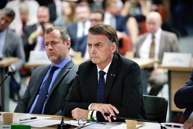 O advogado Paulo Cunha Bueno e o ex-presidente Jair Bolsonaro | Fellipe Sampaio/STF