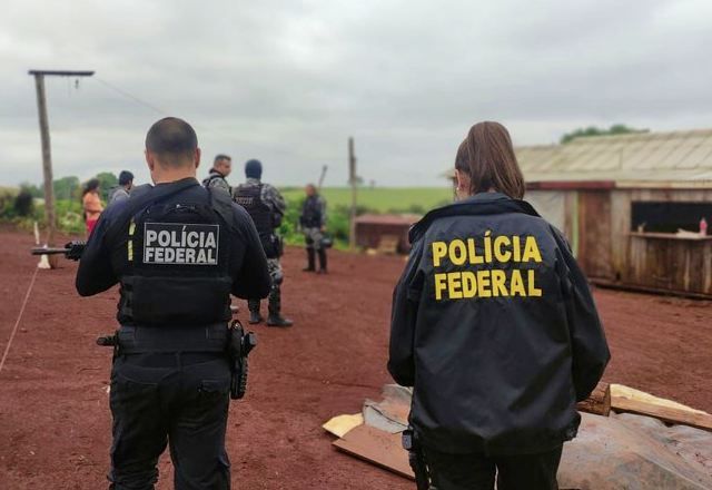 Policiais federais em área indígena em conflito no Sul, com mortes. (Crédito: Divulgação/PF)
