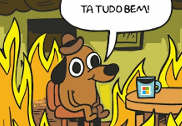 Meme de cachorro sentado dizendo "Tá tudo bem!" com uma casa em chamas, fazendo alusão à Microsoft | Reprodução/Redes sociais